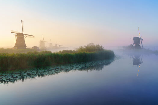 Zonsopkomst op Kinderdijk een foto van De Rooij fotografie