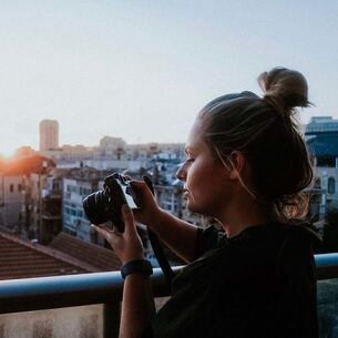 Travel photographer Raisa on the job