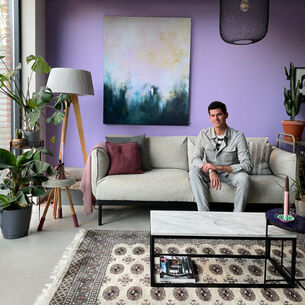 Roy in his living room