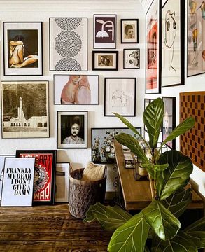 Art collage wall in brown interior